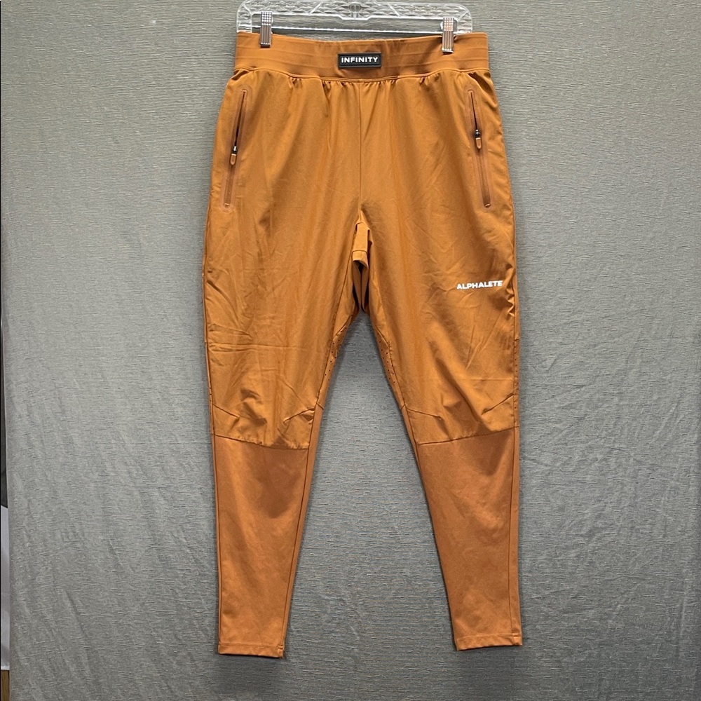 Alphalete Tan Jumpsuit with Tapered Legs and Elastic Cuffs